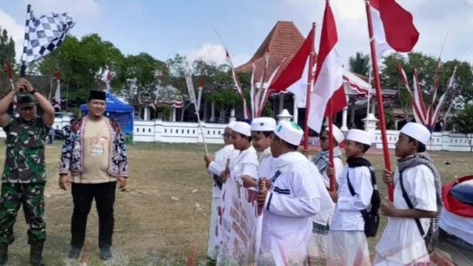 
 Donorojo Gebyar Pawai Taaruf: HUT RI ke-80 Semarak dengan Kreasi Siswa